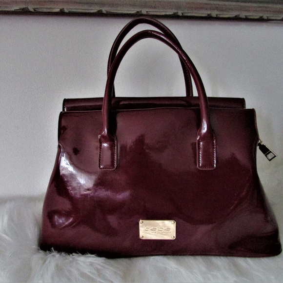 burgundy patent leather bag